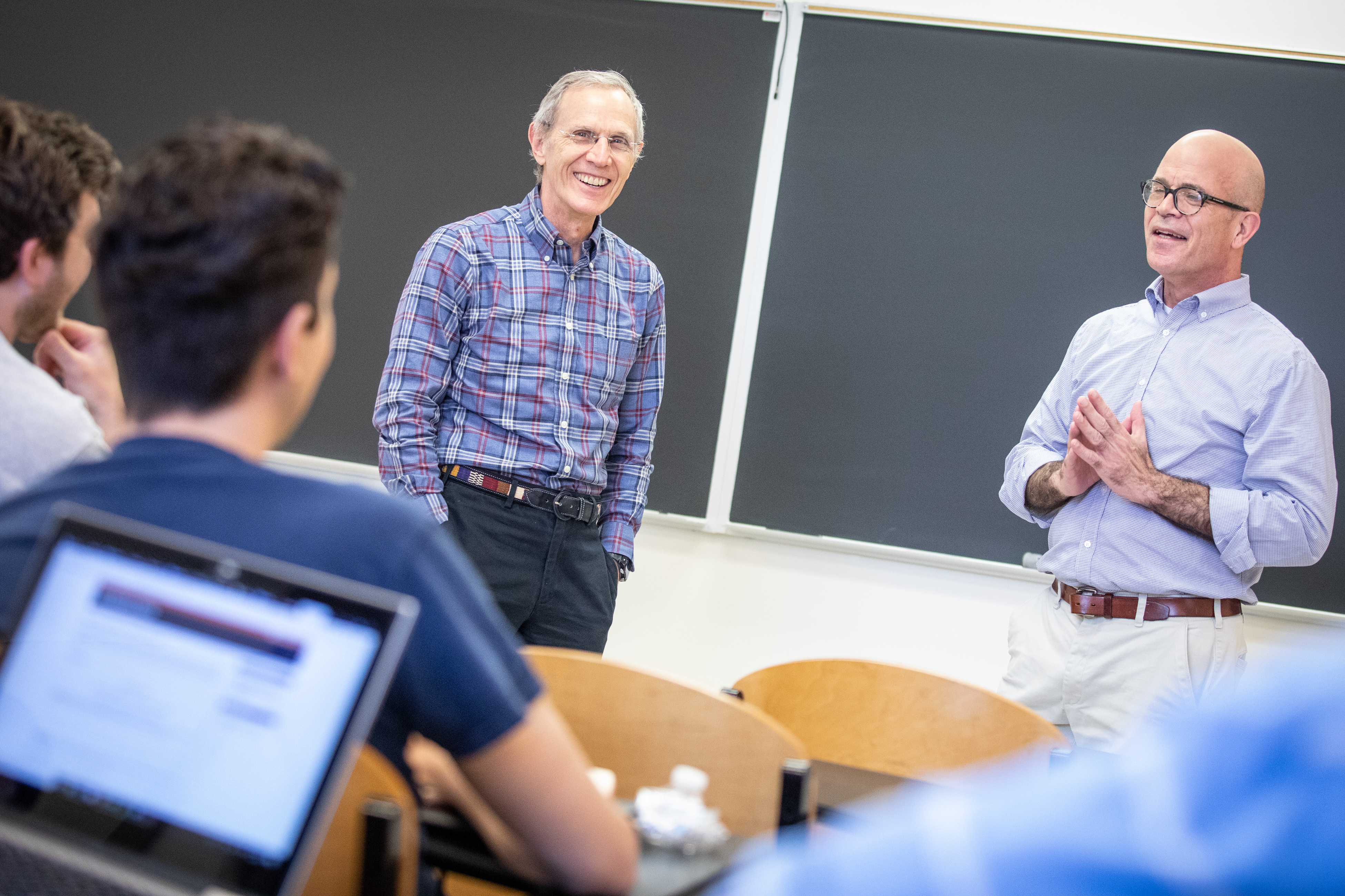 School of Data Science professors Don Brown and Raf Alvarado speak to students