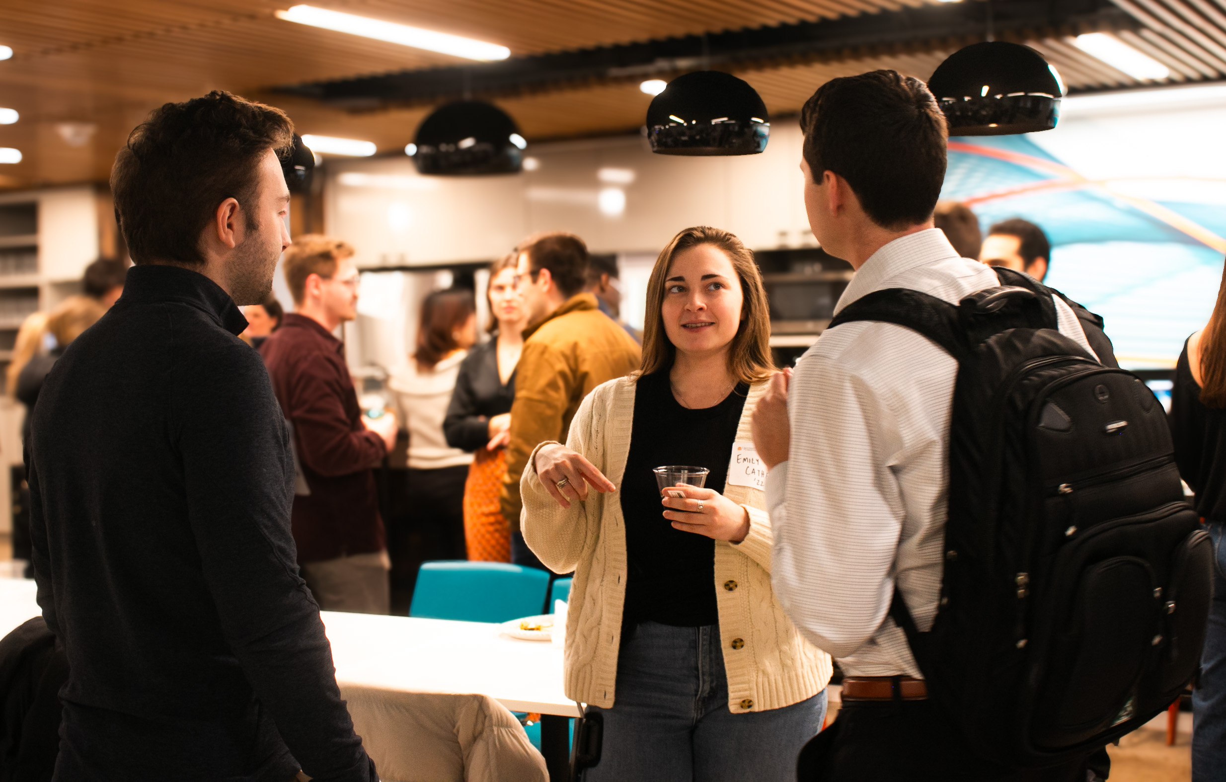 Career Networking Event people standing and talking to each other