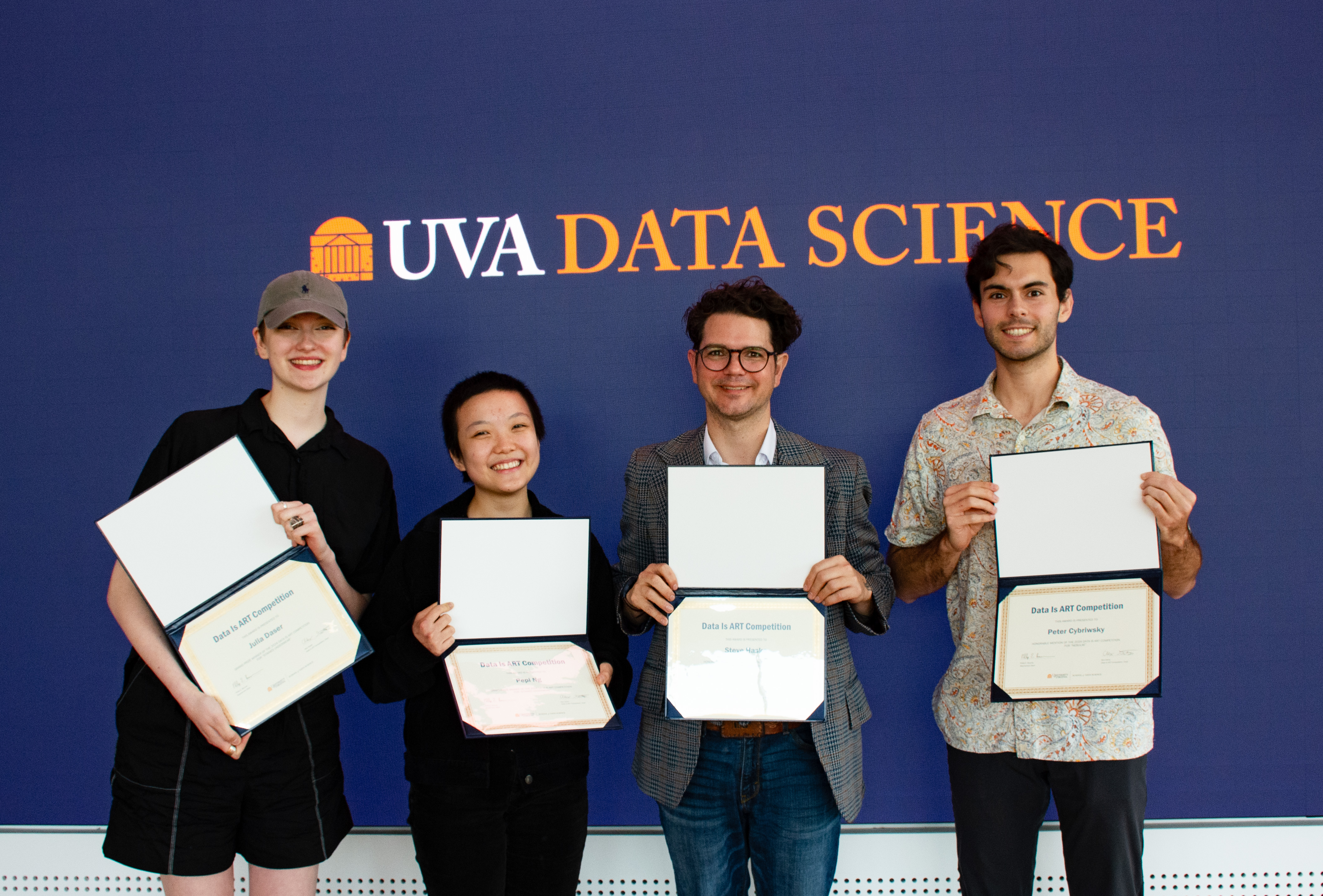 Winners from the Data is Art competition with their awards