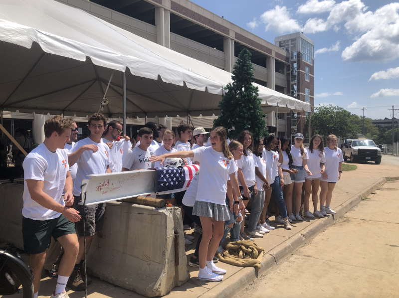 MSDS '23 Students pose in front of signed beam