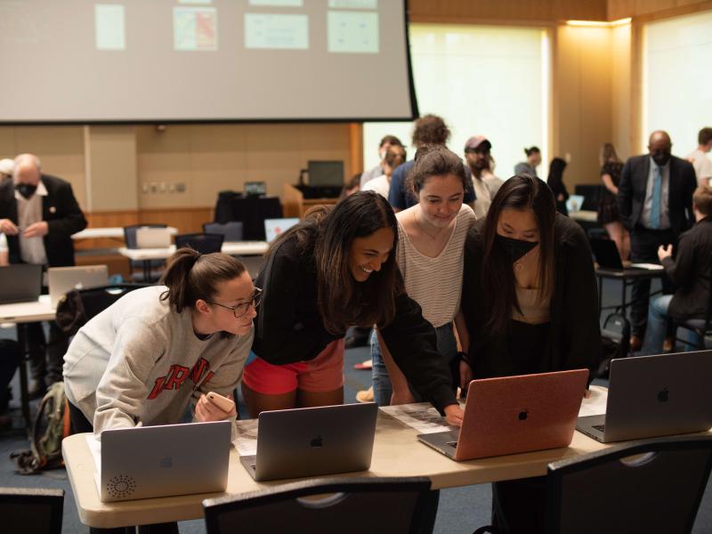 4 students discuss a data viz