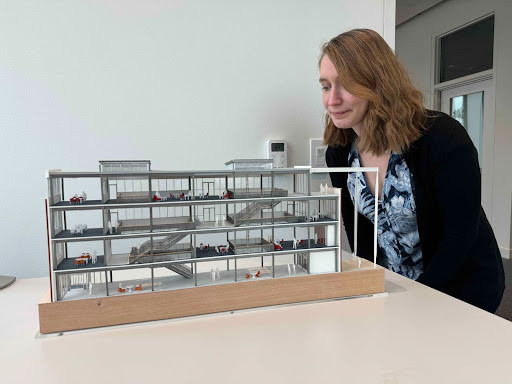 Molly Porter and the model she built of the new Data Science building. 