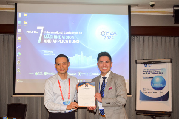 Data Science PhD Candidate Kevin Lin shown receiving his award at the International Conference on Machine Vision and Applications in Singapore