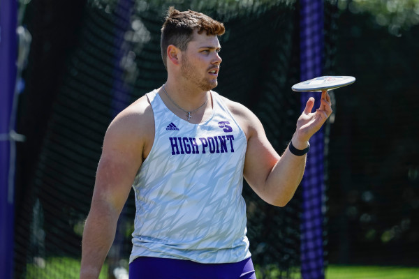 UVA Data Science master's student Chris Van Niekerk prepares to throw the discus at a High Point University track and field event