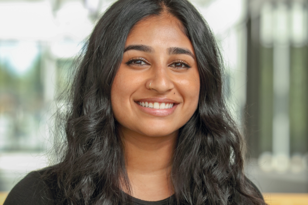 UVA Data Science PhD student Madelyn Mathai in black top for professional photo