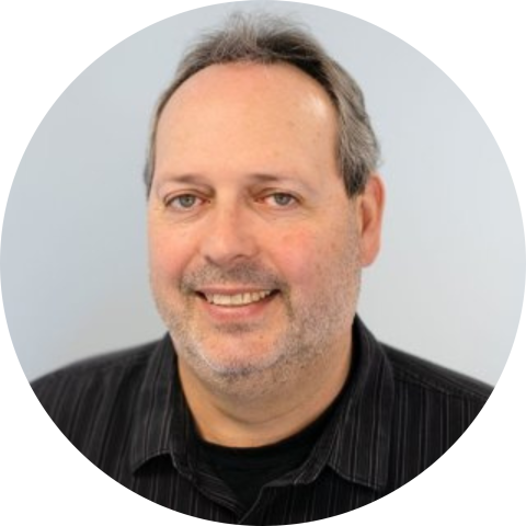 Jay Hertel in black shirt professional headshot circle crop